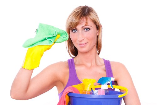 Professional cleaner in Harrow working in a modern living room