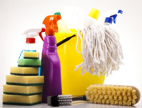 Close-up of a cleaner treating stains during sofa cleaning in Harrow