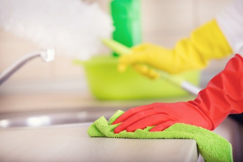 Professional office cleaning team in Harrow vacuuming carpets